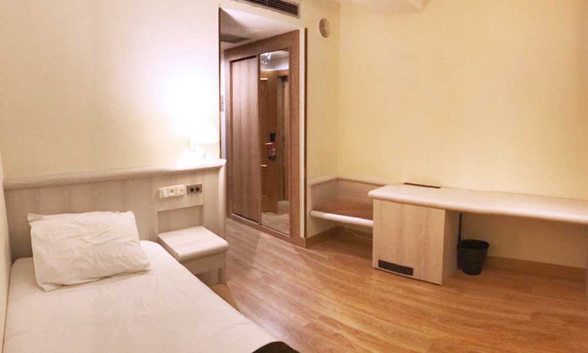 habitacion hotel revestida con material infeel